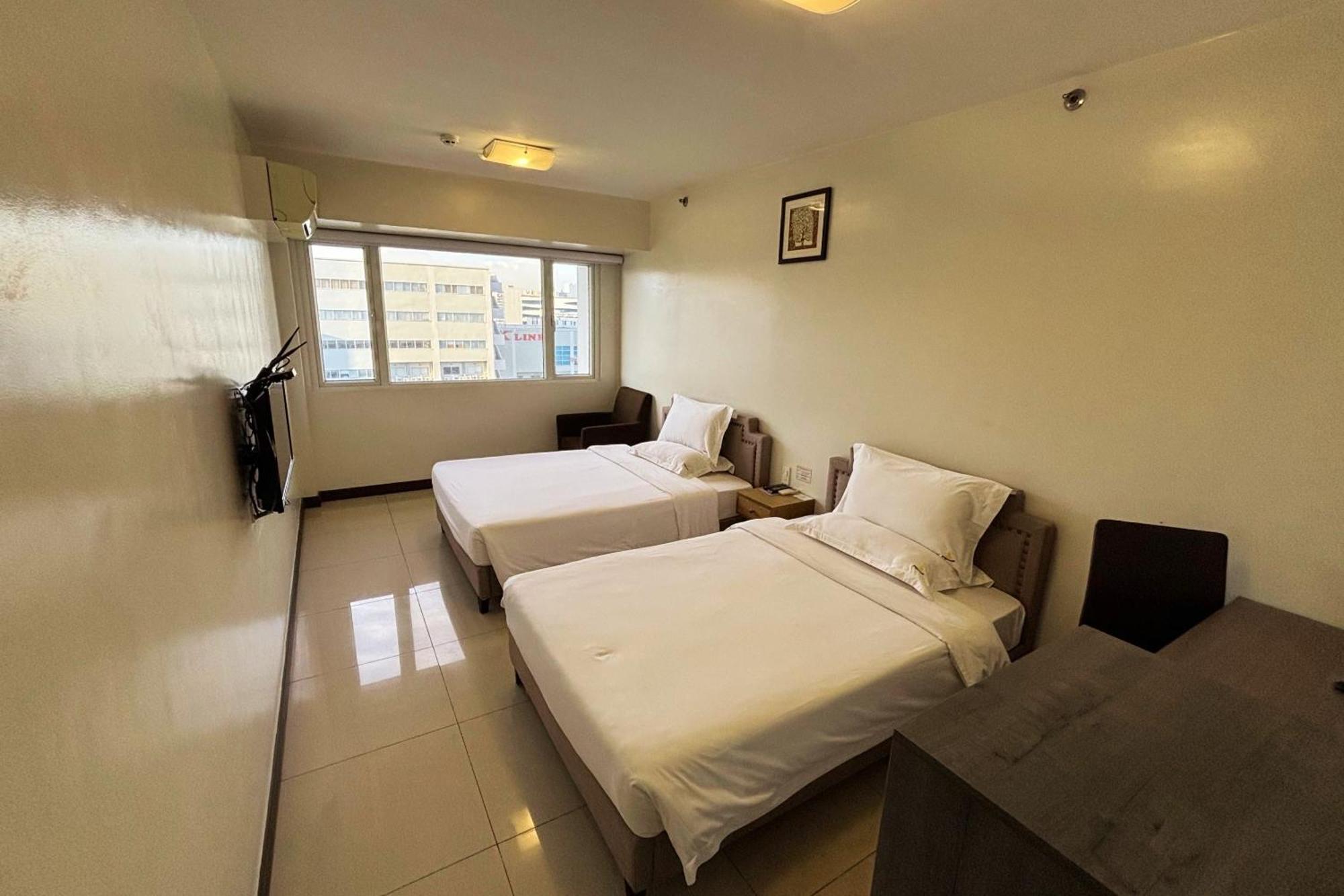 Extremeli Suites Manila Powered By Cocotel Exterior photo